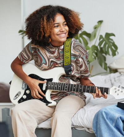 Woman playing the guitar